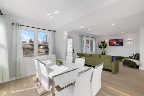 Open layout connecting the living room and dining space seamlessly