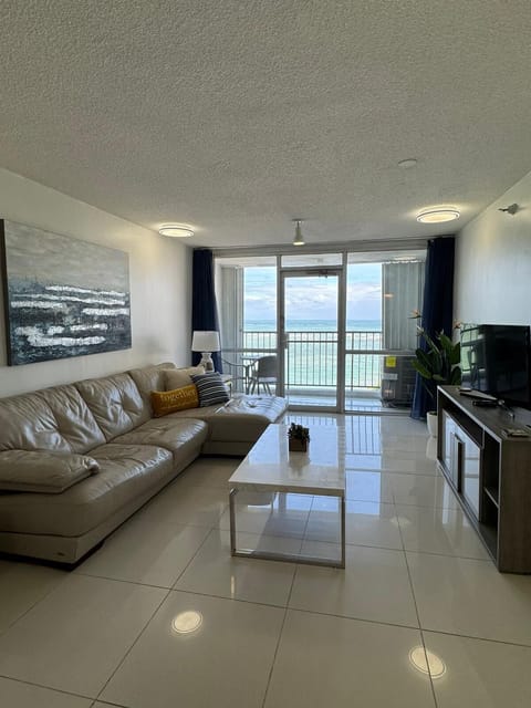Living room and balcony view.