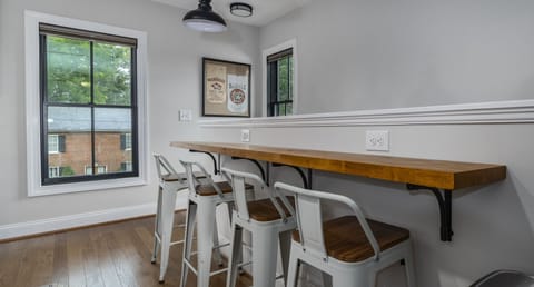 Enjoy a meal at the bar style dining counter with seating for 4 located in the kitchenette.