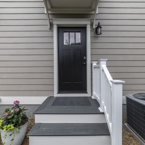 Secure private entrance door to the entire second-floor property