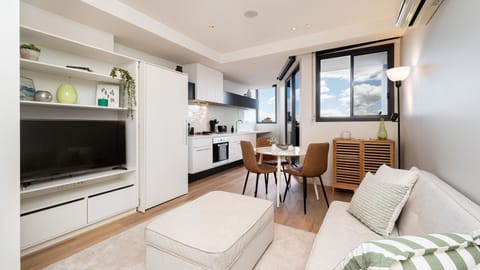 Light and bright open plan living with split system for heating and cooling