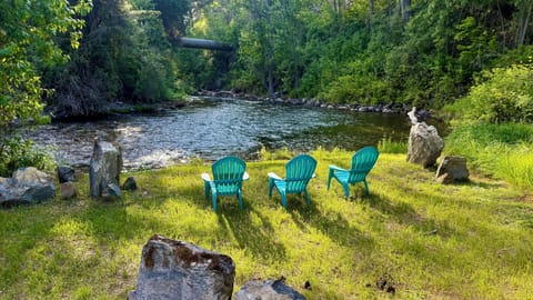 seating on Jocko river bank, near hammock
