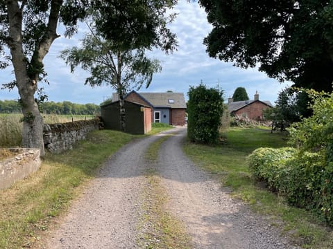 The approach to the cottage is along a farm track