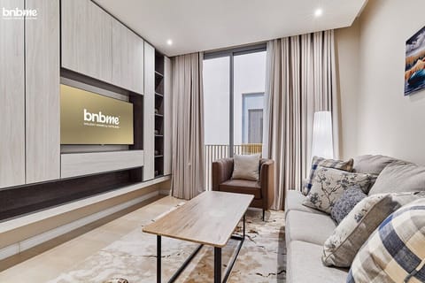 Living Room: "Unwind in style in our inviting living space, designed for comfort and relaxation during your stay."