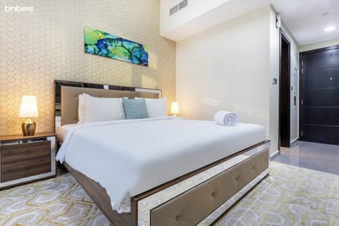 Studio Apartment Bedroom: "Indulge in luxury and comfort with our king-sized bed, ensuring a restful night's sleep in style."