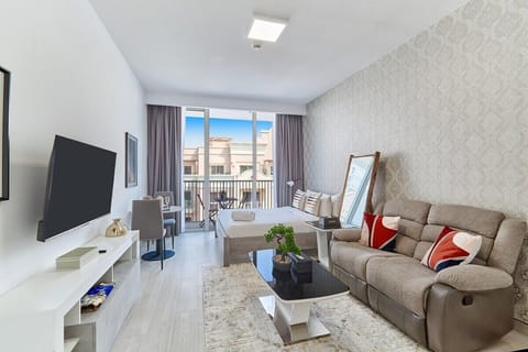 Unwind in a beautifully designed space featuring a Queen bed, a comfy sofa, and a dining area.