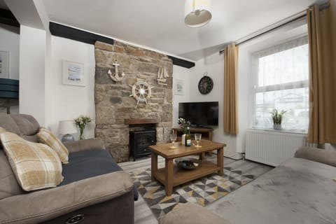 Living room is open plan with the kitchen and dining area with Smart TV, seating 6 - Bryher Cottage, Stay Ca Holidays