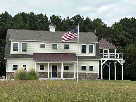 Front of house, front door, plentiful parking to the left