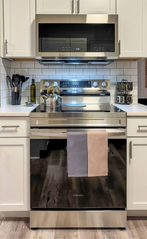 Electric glass top stove - all appliances are new!