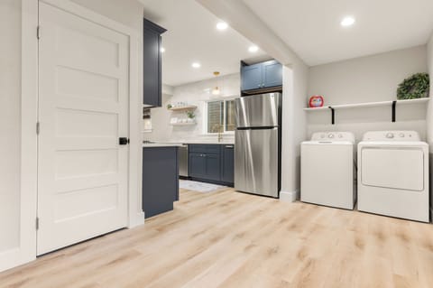 Laundry area is located off of the kitchen area