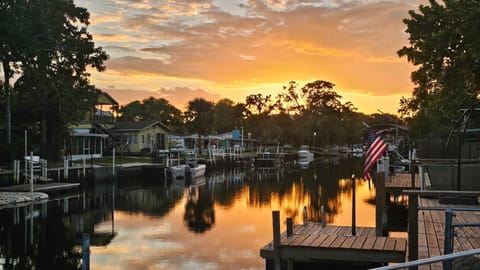 Unwind with golden sunsets and river views at the Wet Feet Retreat