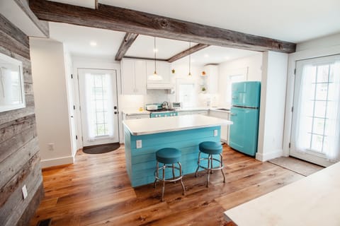 Airy chef's kitchen in a vintage-modern 1950s era style