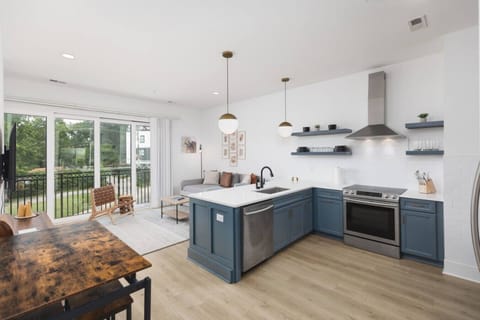 Condo 1 - Fully-stocked kitchen with high-end appliances and all the utensils / dishware you'll need.