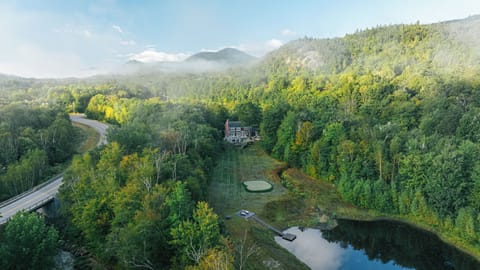 11 Private acres with your own golf course, pond and Pemi River frontage
