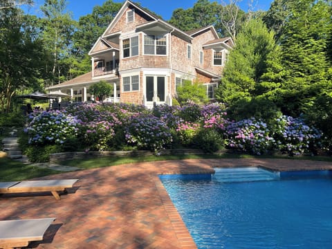 Private heated pool, teak lounge chairs, umbrellas, pool-side teak table, towels
