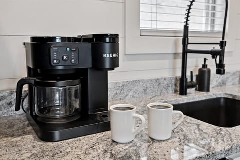 Coffee Corner: Sip fresh brews from your personal Keurig while enjoying stunning granite countertops!
