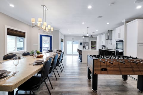 Spacious dining table that sits 12 with full tableware and silverware included.