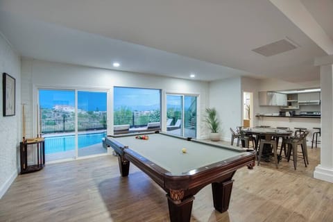 Rack 'em up! Lower level game room with pool table and panoramic Four Peaks views.