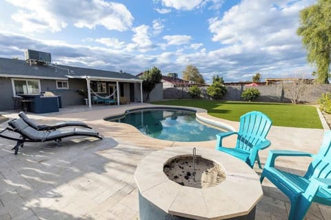 Relax by the fire pit with poolside & pool lounge.
