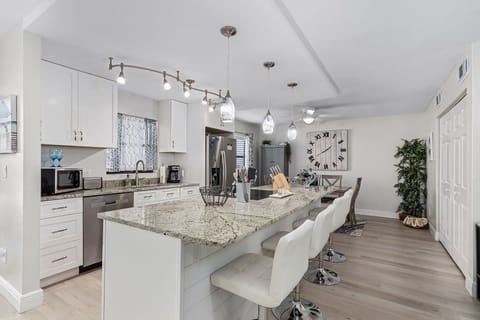 Modern farmhouse décor creates a cozy, welcoming atmosphere.