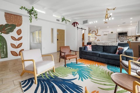 St. Pete beach–themed gathering room and kitchen — bright, colorful, and perfect