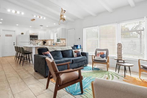 Enjoy the fun St. Pete beach vibe in this colorful gathering room and kitchen.