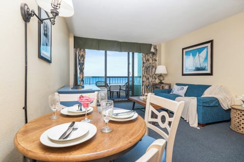 Open-concept living and dining space with beautiful ocean views