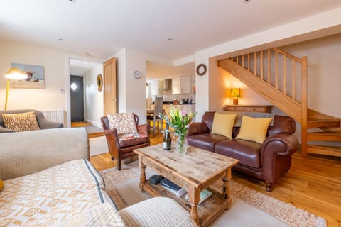 Ground floor: Sitting room area with a Smart television and wood burning stove