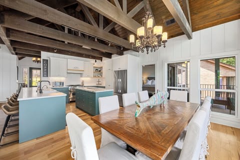 Open-concept kitchen/dining/living space comfortable fits 14-16 people.