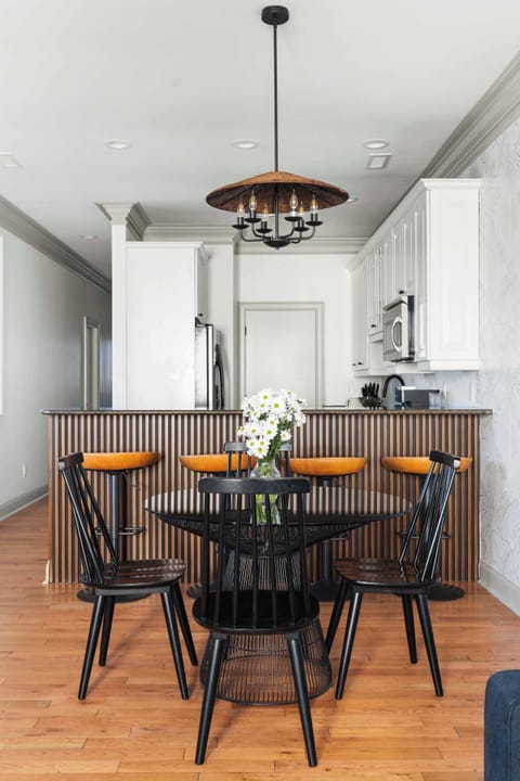 A full kitchen with an entertainment table and bar setup, perfect for gathering your whole group.
