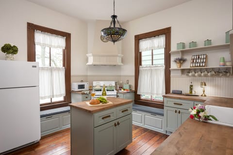 Tiffany style stained glass chandelier & cozy window seats