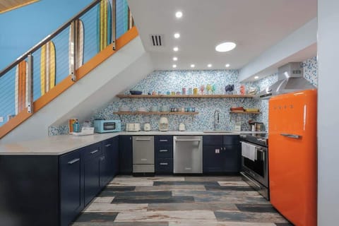 A designer kitchen that’s as functional as it is stunning  high-end finishes, bold style, and premium Smeg + KitchenAid appliances that make every meal feel elevated.