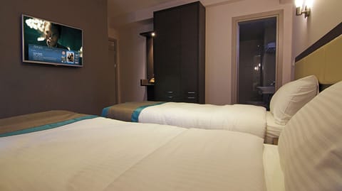 Unit with Double bed. Exact unit will be assigned upon arrival. Views, colors, and decor may vary.