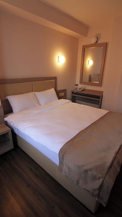 Unit with Double bed. Exact unit will be assigned upon arrival. Views, colors, and decor may vary.