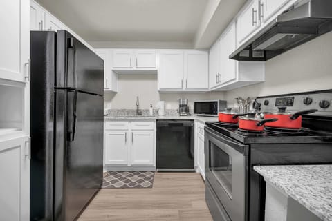 Stylish kitchen w/ modern finishes and plenty of prep space.