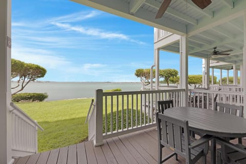 Back deck with outdoor dining overlooking the ocean