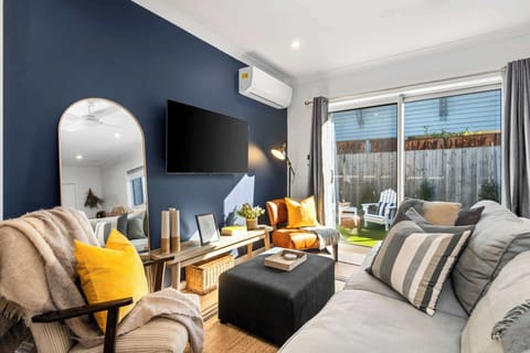 Open plan living featuring stunning decor and ample seating. 