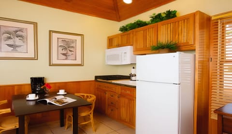 Brew coffee and prep snacks in the cozy kitchenette.