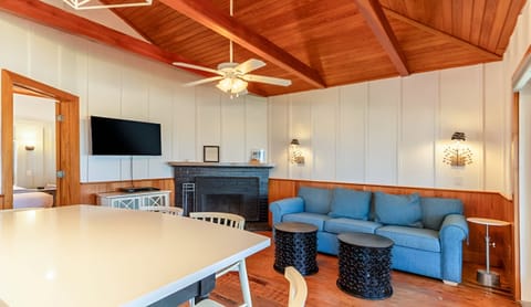 Relax fireside on plush seating after a beach day.