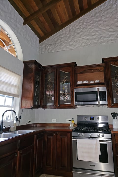 Meal prep is a breeze in this bright, full kitchen.