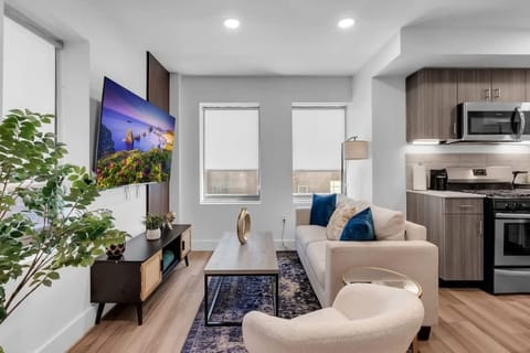 Open-concept living area with a flat-screen TV!