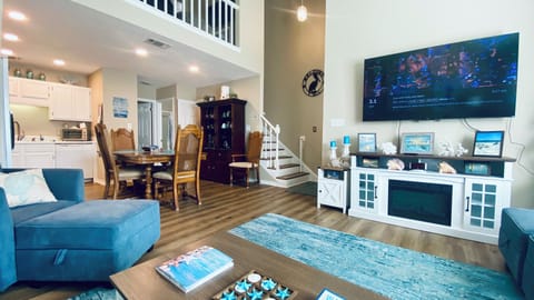 Spacious open floor plan , from entryway to living, dining and kitchen.