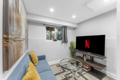 Unwind in this stylish space. Enjoy a movie night on the large screen, relax on the comfy sofa, and feel right at home. Perfect for a restful getaway.