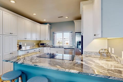 The beautiful kitchen will make island meals a breeze