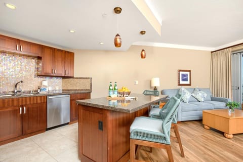 Whip up island-inspired meals in a stylish kitchen with granite counters and a view of the living space HKH-537