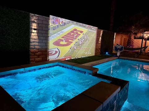 Cheer on the big game from the pool, soak in the spa, and turn every night into an unforgettable backyard experience.