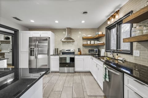 Cook, gather, and host in our fully stocked chef’s kitchen with a view