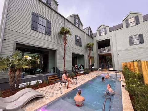Salt water pool features two Baha sunning decks, bubblers and loungers.