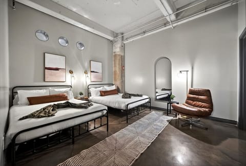 “Room for everyone” — Spacious and thoughtfully styled, this double-bed setup is perfect for sharing while still feeling private