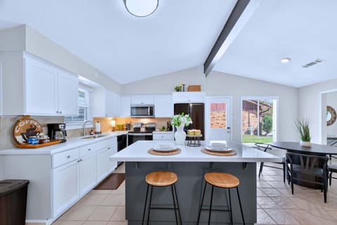 Spacious Kitchen: Modern design with stylish island, perfect for culinary adventures!